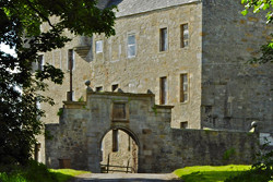 The arch where Jamie was flogged at Midhope Castle which was used for Lallybroch which you can see on this Outlander Tour